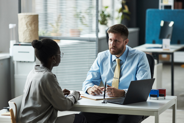 Executive search consultant guiding nonprofit leader through a rigorous, relationship-driven hiring process